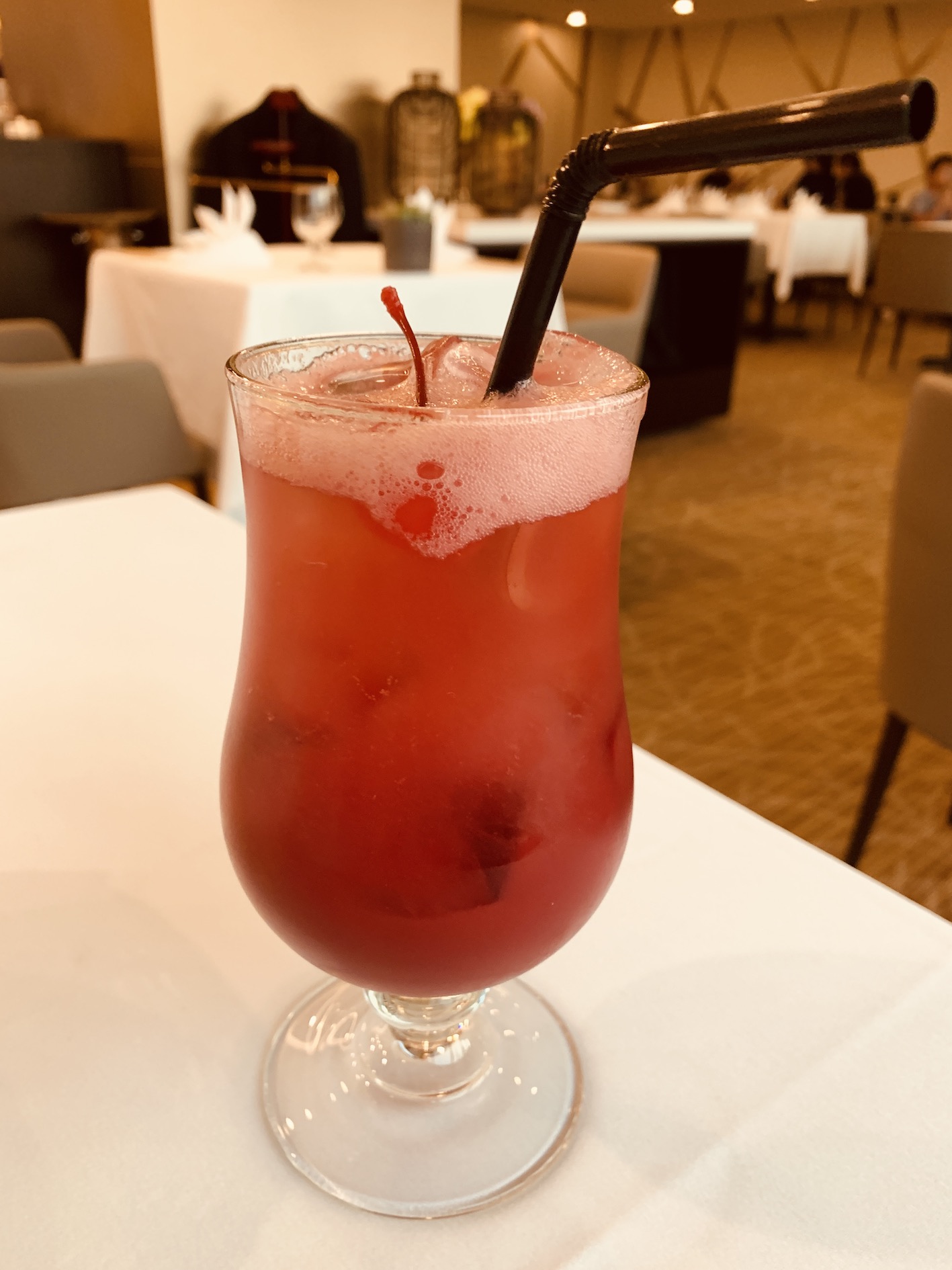 Amber West - Sparkling Tart Cherry Mocktail